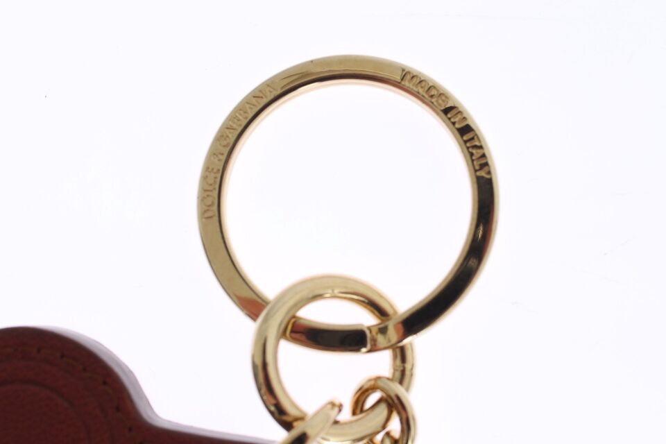 Elegante sleutelhanger van bruin leer met gouden details